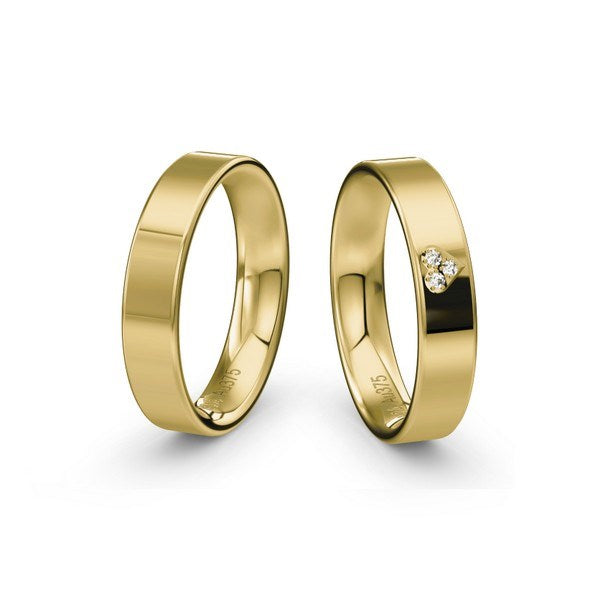 Romantiske Siersbøl vielsesringe i 9 eller 14 karat guld med hjerte og 0,021 ct diamanter fra Siersbøl Wedding.